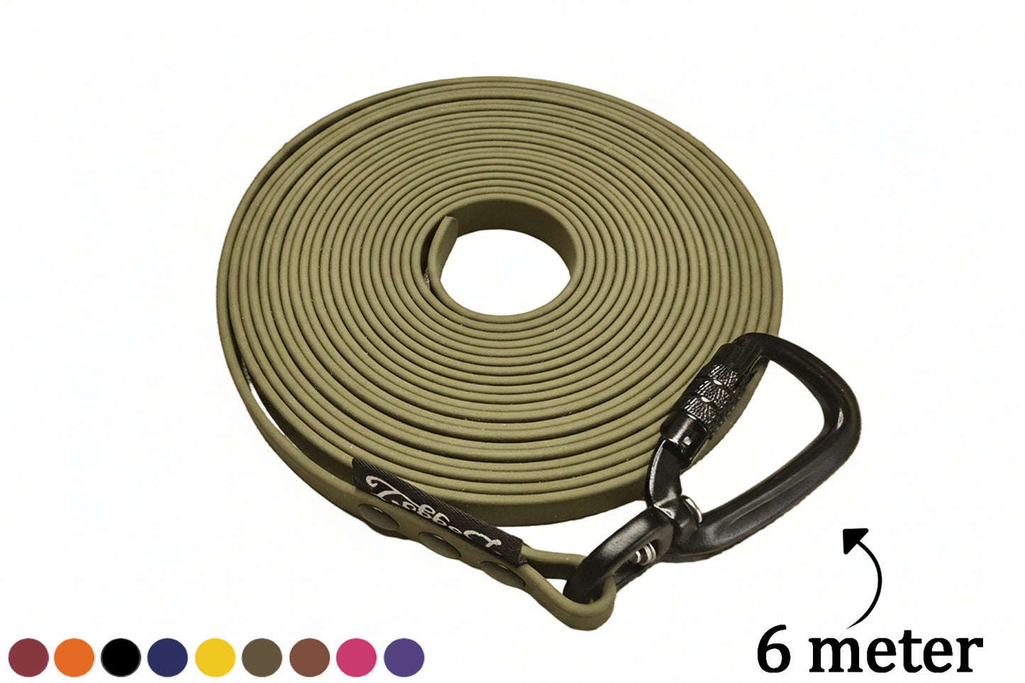 A tightly coiled olive green BioThane drag line of 6 meter and 5 meter. Features a robust black auto-locking carabiner, rivets, and a black DoggoZ tag on a pure white background, illustrating the full length range available for customization and a row of customizable color swatches.