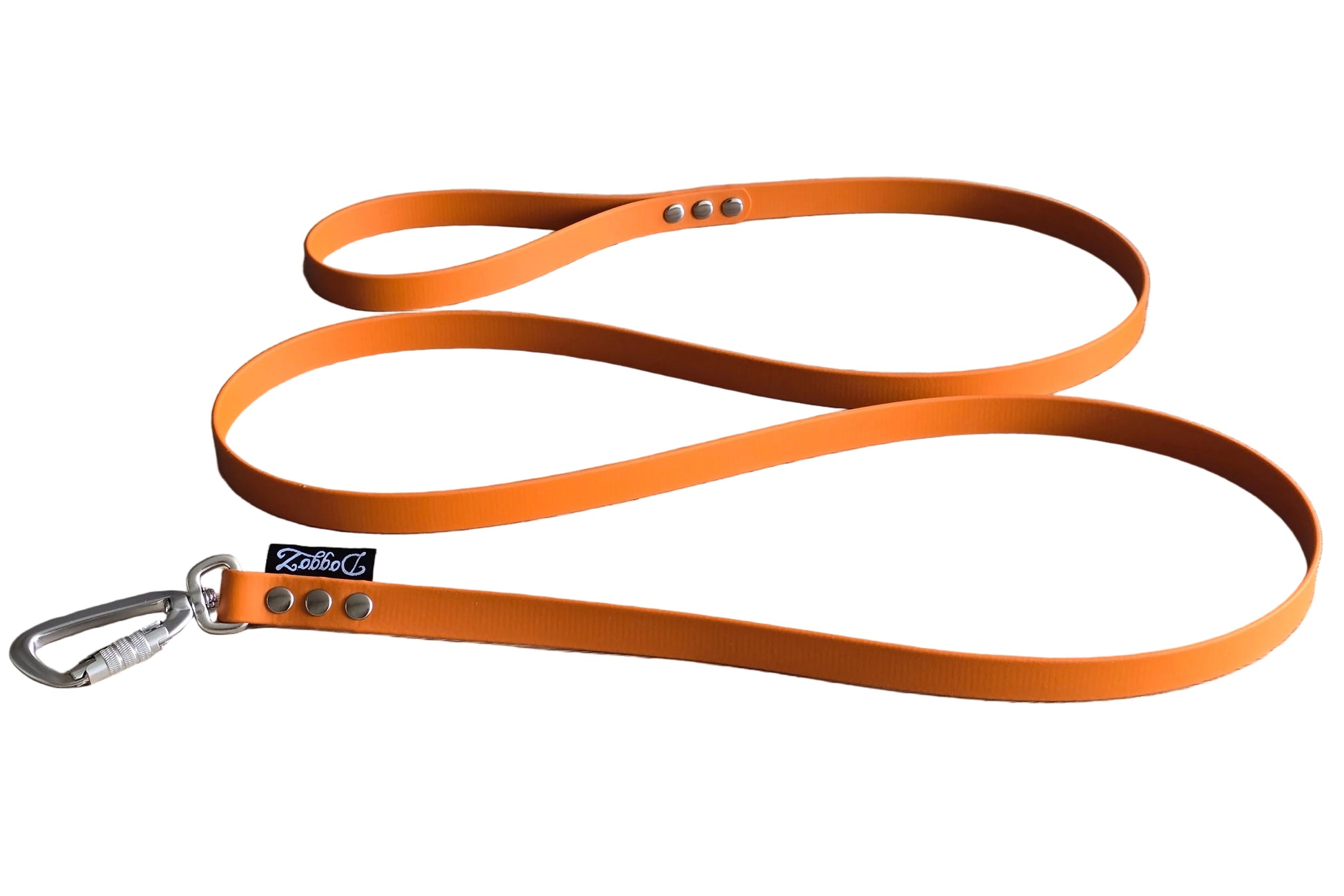 A photograph of a durable, handmade orange BioThane dog leash with silver hardware and carabiner, shown rolled against a white background.