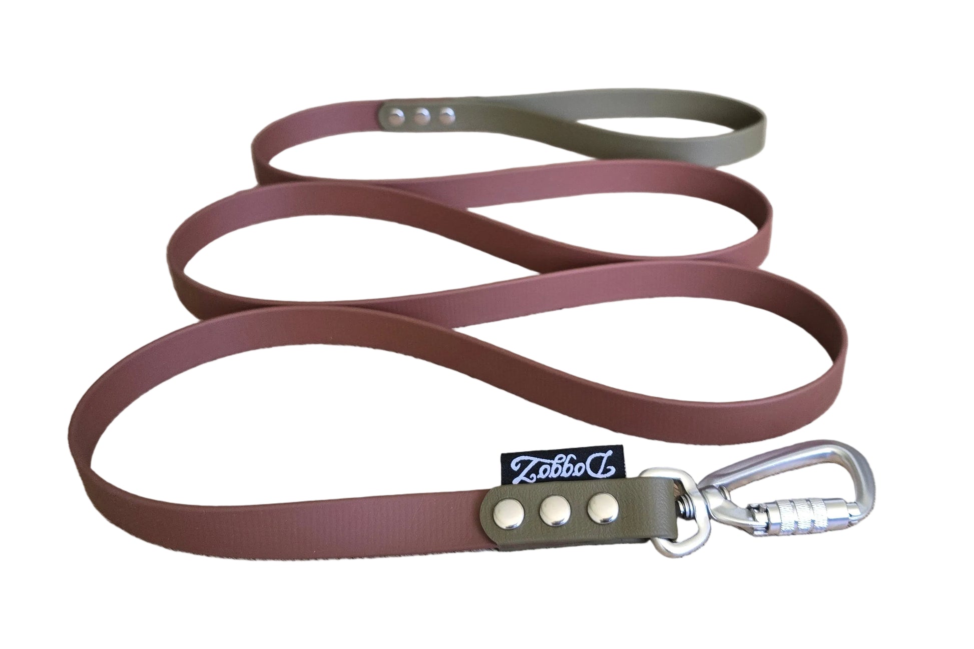 ​Handcrafted two-tone BioThane dog leash in brown and olive green, featuring a silver auto-locking carabiner and silver rivets with the DoggoZ brand tag.