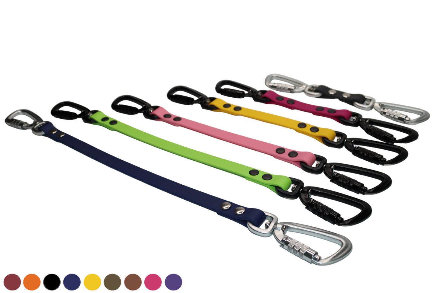 A lineup of DoggoZ SAFE BioThane Safety Straps in various colors including navy, lime, pink, and yellow. These extra security connectors feature dual carabiners in both silver and black finishes. Showing a choice of multiple colors: wine red, orange, black, navy blue, sunflower yellow, olive green, brown, magenta pink, purple