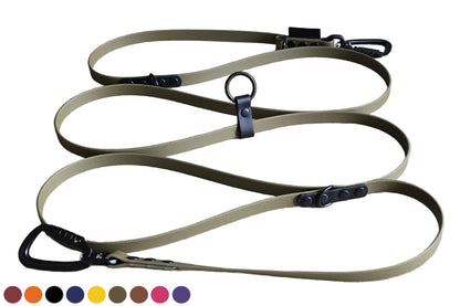 A detailed photograph of a Doggoz hands-free BioThane dog leash in green olive color, features black accents for the ringslipset and  D-rings and O-ring, and uses black carabiners. The durable, coiling leash is displayed on a clean white background. and a row of customizable color swatches.